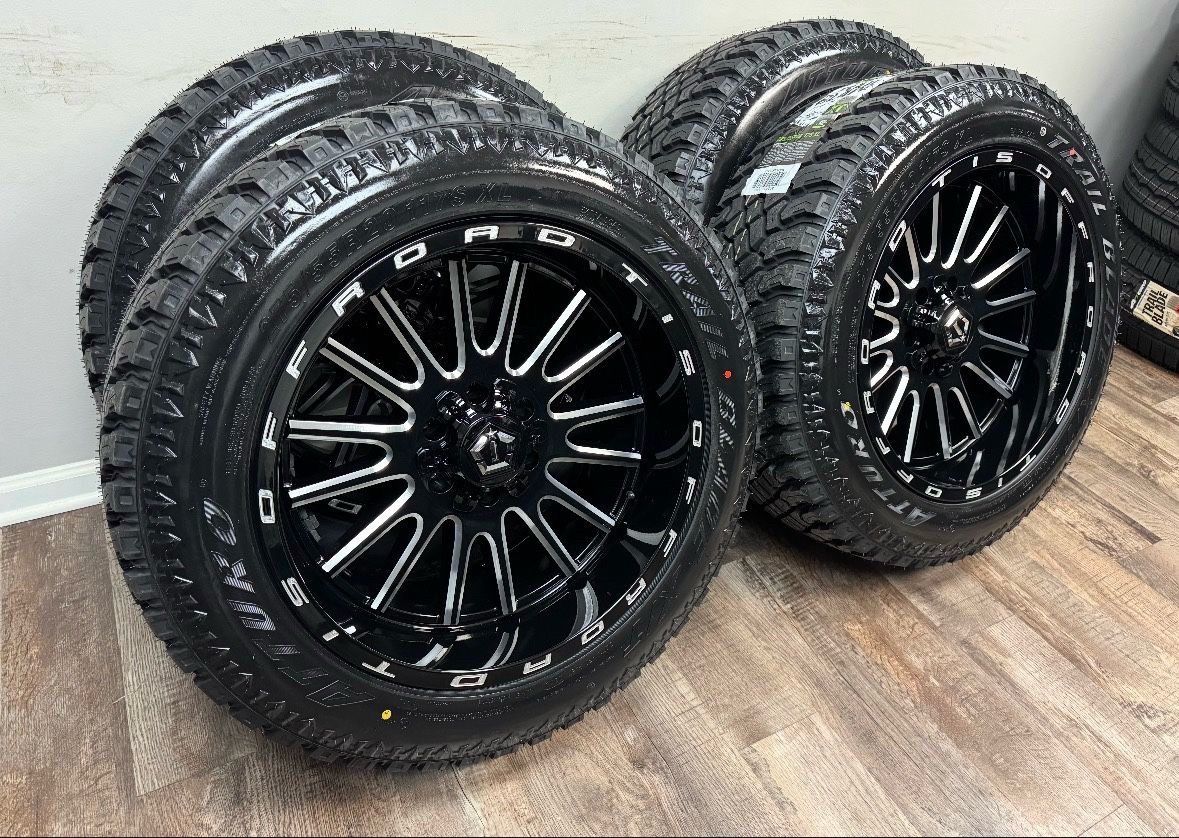 NEW 20x10 tis wheels wrapped in atturo xt tires 275/55r20. -25 offset