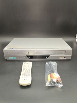 Zenith, VCR/DVD Player with remote and cable.  Works fine.