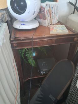Vintage table with metal wheels