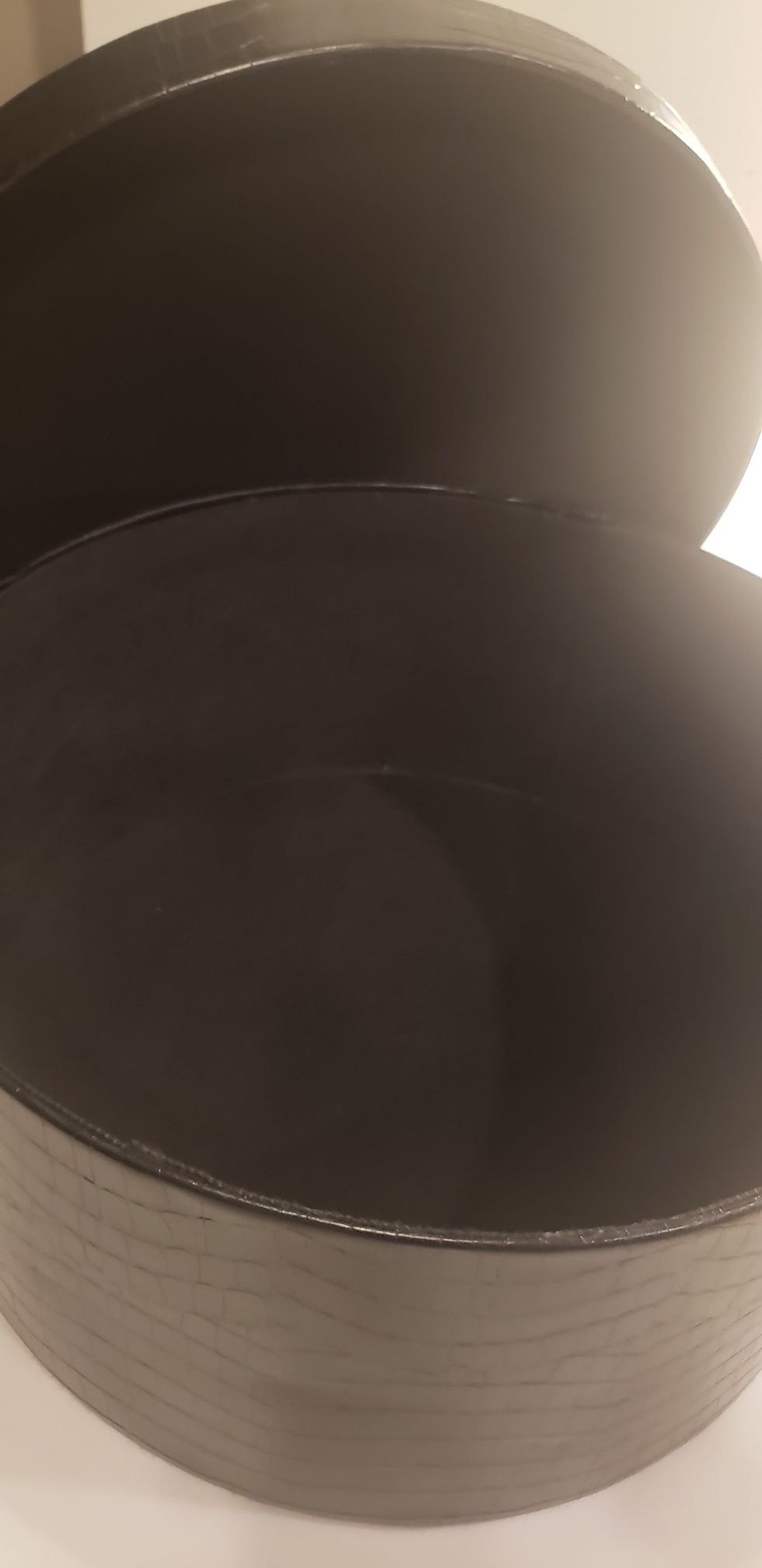 Black leather circular hot box