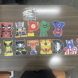 Birthday superhero themed decorations and r2d2 gift bag