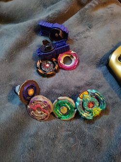 BeyBlades And Beyblade Pieces