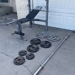 Weight Bench And Weights And Bar 