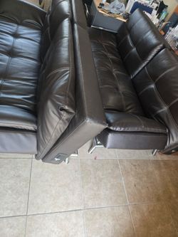 Dark brown leather reclining couches