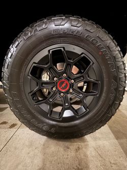 33-inch Toyo all-terrains (265/70R18
