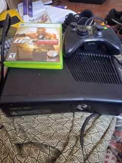 Xbox 360 slim with one controller 2games
