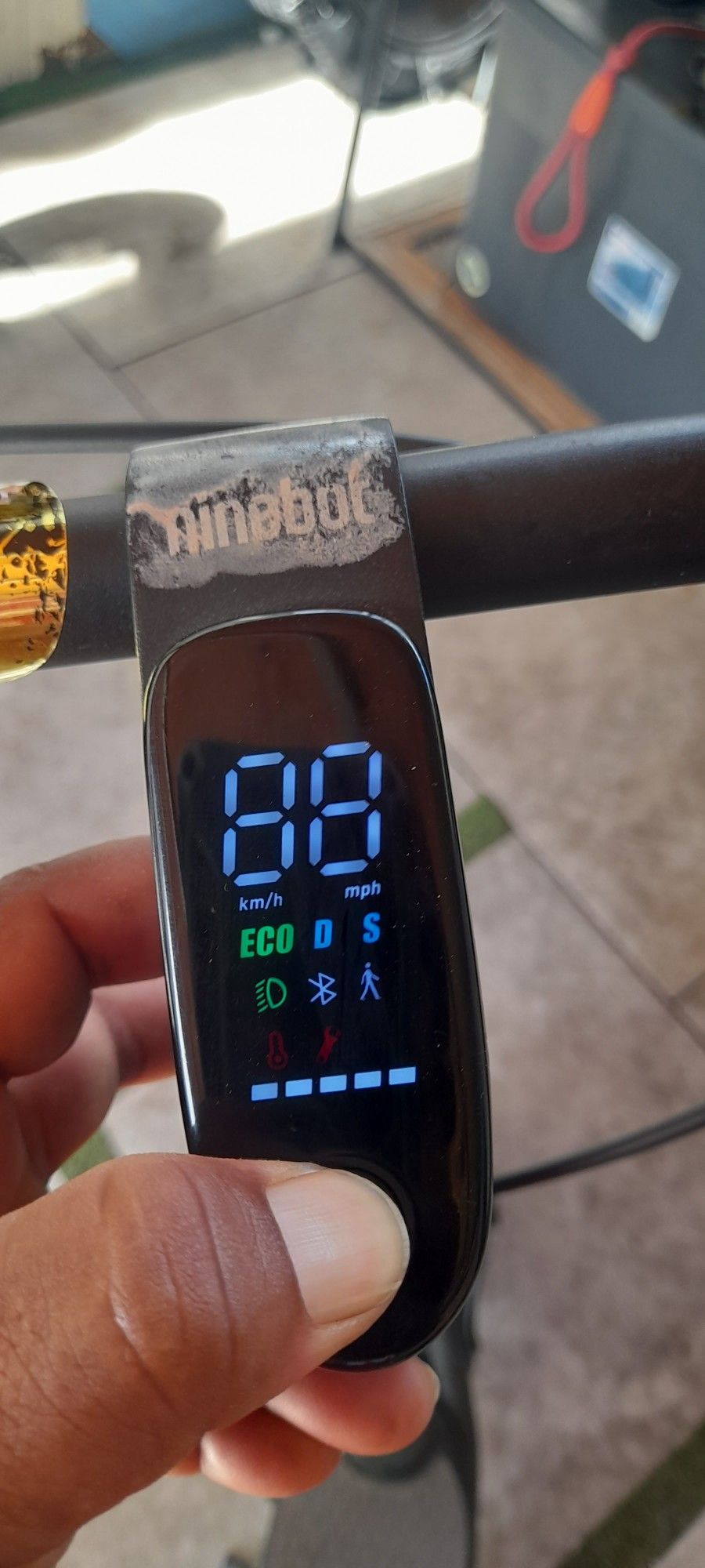 NINEBOT POWERED BY SEWGWAY WITH ITS CHARGER, USED IN GOOD CONDITION