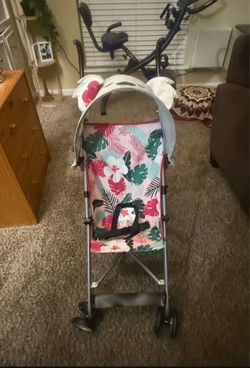 Floral Baby Stroller Colorful floral design with canopy.