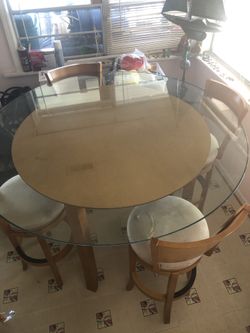 High top kitchen “pub” table with 4 swivel chairs