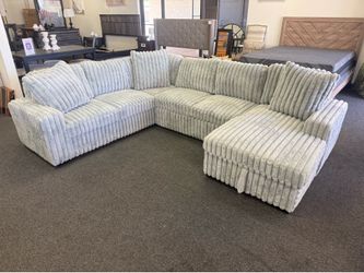 Sleeper sectional with storage and usb ports