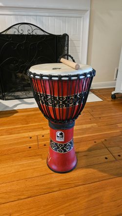 12-inch Toca Freestyle Series Rope-Tuned Djembe in this Bali Red finish