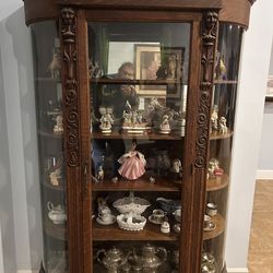Antique curved glass display case