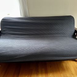 Futon With Grey Cover 