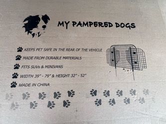 MY PAMPERED DOGS KEEPS PET SAFE IN THE REAR OF THE VEHICLE MADE FROM DURABLE MATERIALS FITS SUVS & MINIVANS WIDTH 39" - 79" & HEIGHT 32" - 52" MADE IN