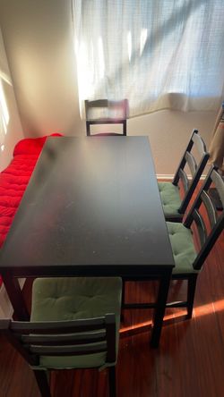 Dining table + four chairs