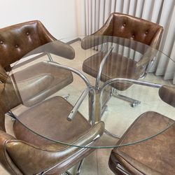 Glass Table And 4 Swivel Rolling Chairs