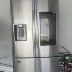 LG Smart InstaView French-Door Refrigerator with ThinQ screen.