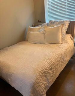 Like new queen mattress and bed frame