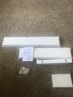 New set of white floating shelves