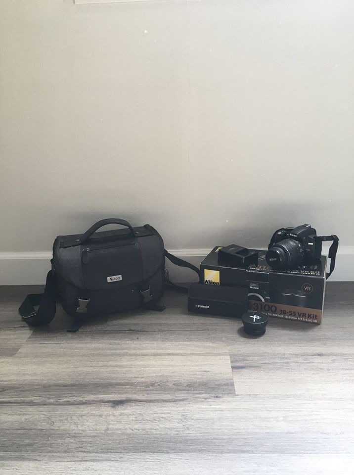 Nikon D3100 with 18-55mm lens and accessories