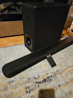 Yamaha ATS-2090 soundbar with subwoofer and remote.