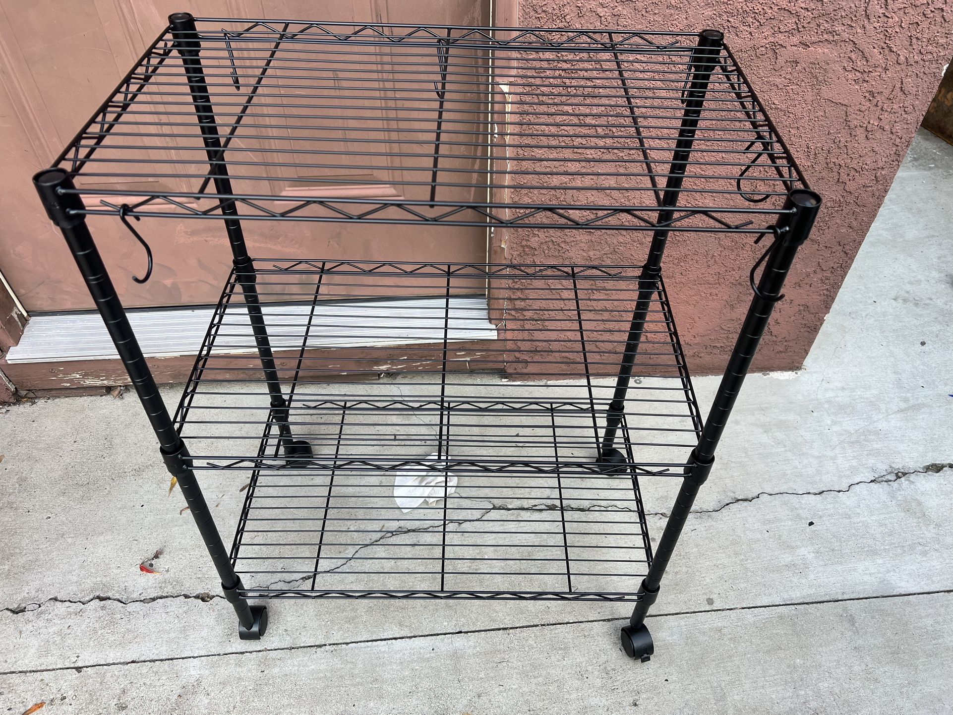 Metal storage rack with wheels