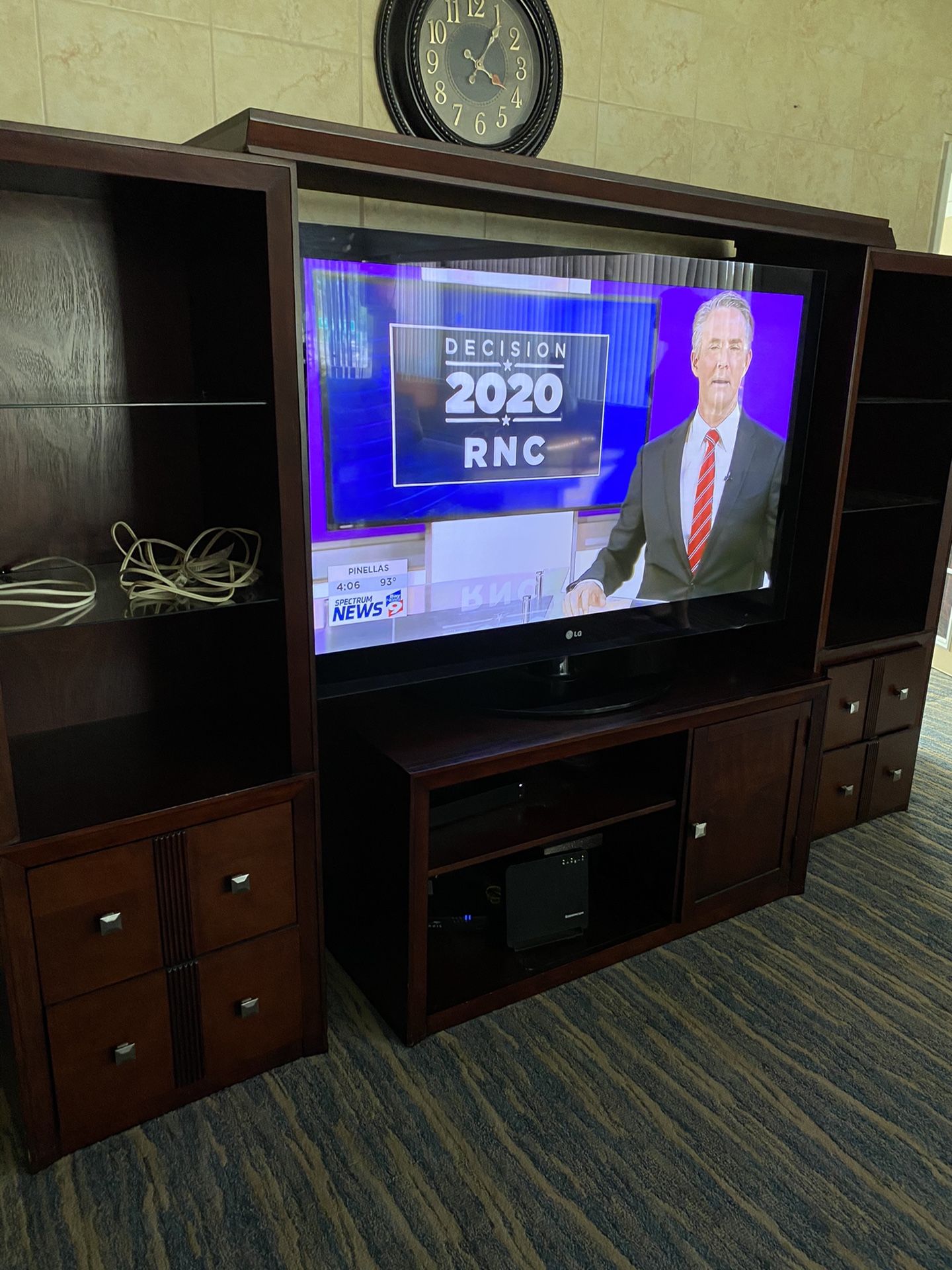Furniture wall unit in good condition also dining room glass table with six chairs and three glass tables 500 cash
