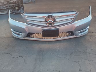 2011-2014 Mercedes C250/300 Front Bumper With Grills And Fog Lights And Inner Fillers And Accessories Oem.