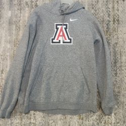 University of Arizona Nike Gray Hoodie with Blue Tag size XL  Small stains shown in last two pictures   Soft gray hoodie with a classic Nike logo. Fea