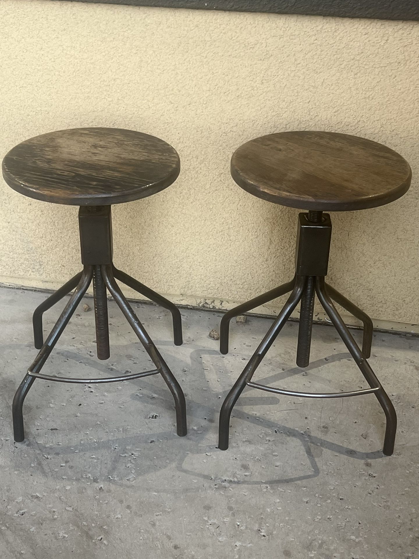 Industrial Style Vintage Set If Bar Stools Adjustable Paid. 600 Each Asking 325 Both.