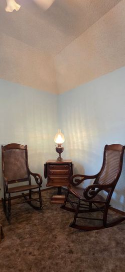 Antique cane rocking chair, table, lamp