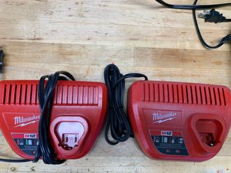 Two Milwaukee M12 Chargers, one one never used.