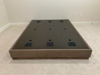 Queen-sized solid wood bed frame