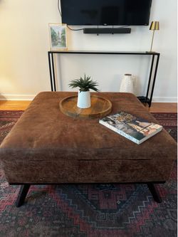 Leather coffee table with storage