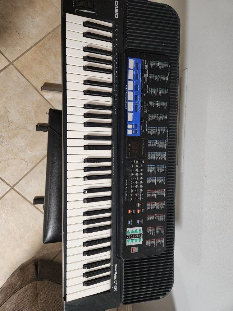 Casio Keyboard with stand and bench