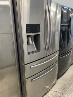 Samsung 4 door fridge in stainless steel