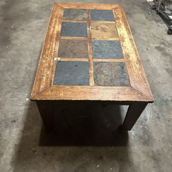 Worn Rolling Coffee Table With Stone Square Design