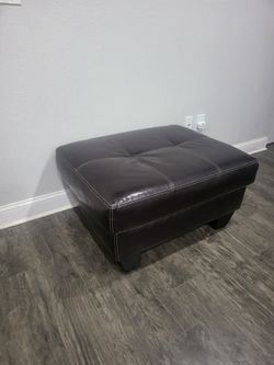 Dark brown leather ottoman