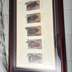 This framed lithograph, titled "Lakers Legends," is a highly collectible piece of NBA memorabilia created by artist Ann Nielson (often signed as A. Ni