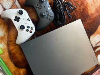 Xbox One X Console with controllers