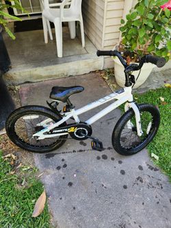 white RoyalBaby Freestyle BMX-style kids' bike