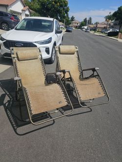 Set Of Two fold up lounge chairs for patio