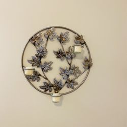 Antique high quality metal ornament with 3 candles. Designer hand made. Like new. Hang it on the wall and enjoy. Ring is 15.5” in diameter. Swinging c