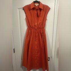 Vibrant Orange Sleeveless Dress with Gold Accents