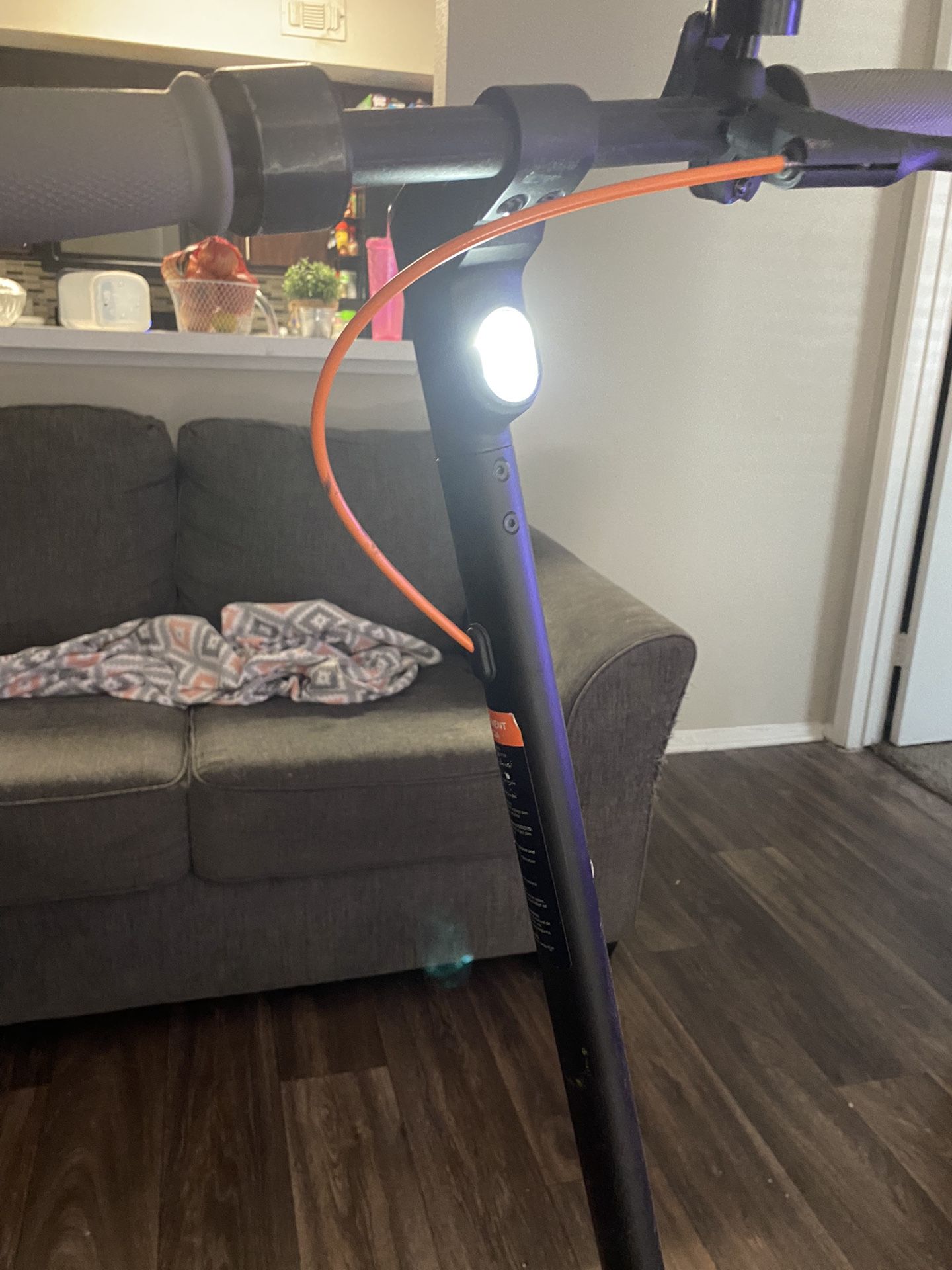 Segway Electric Scooter With Back Break And Headlight And Has A cellphone Holder