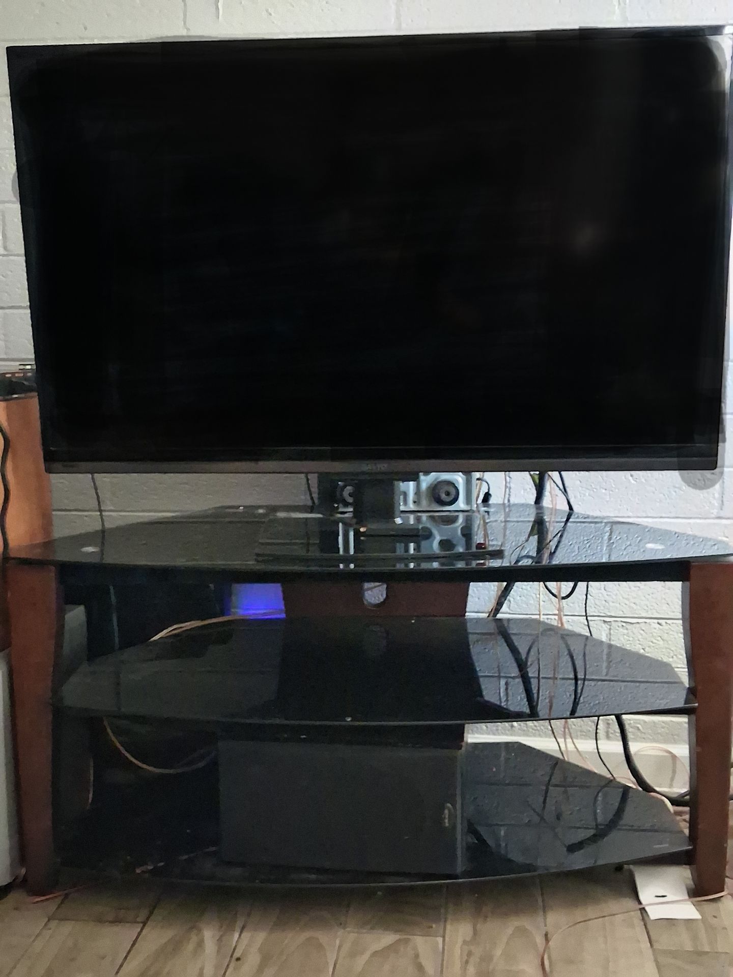 Sanyo 48" TV with Firestick + TV stand