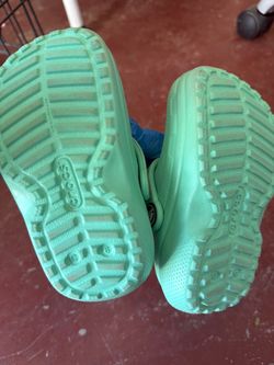 Teal crocs