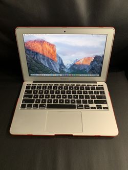2015 MacBook Air 11” with case and over $600 in paid software