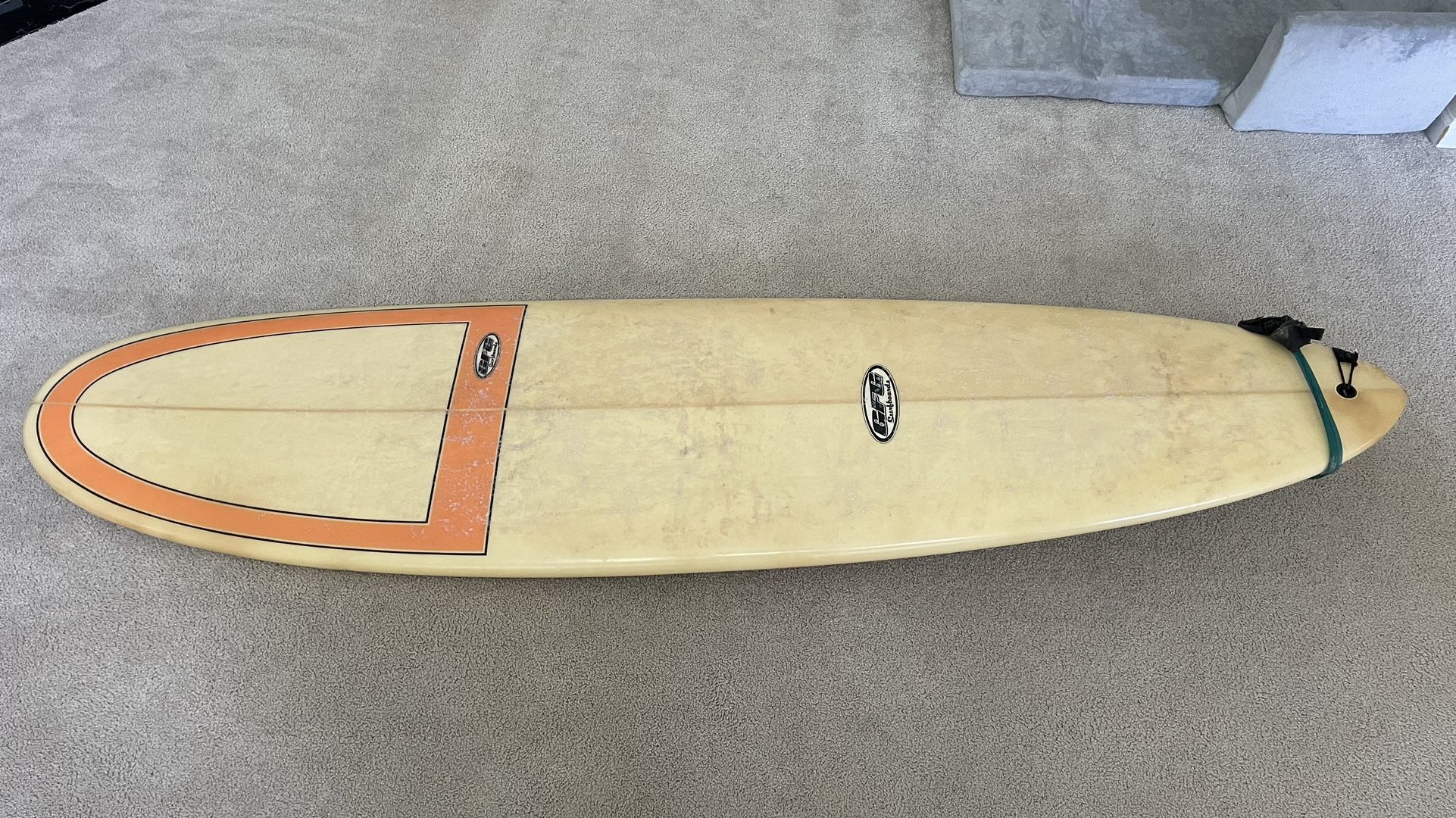 Surfboard 7’ -6”.