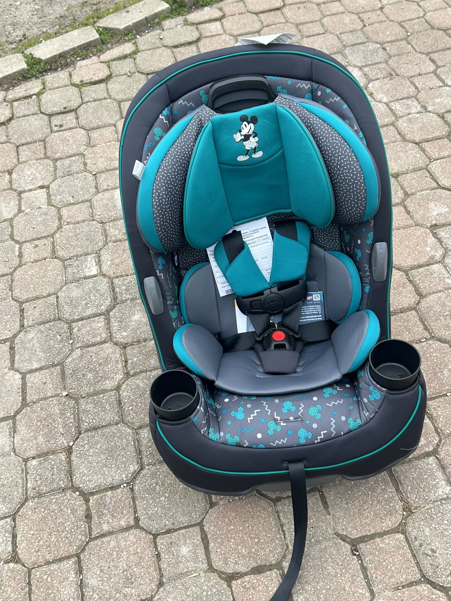 new just assembled mickey mouse. all in 1 car seat 5-100 lbs rear and forward facing